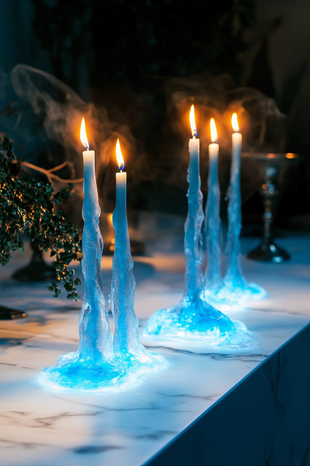 Close-up of an arrangement of ghostly candles with translucent blue flames on a sleek white marble surface. The candles are surrounded by subtle dark greenery and antique decor pieces, with a dramatic spotlight highlighting their eerie glow, creating a sophisticated Halloween ambiance.