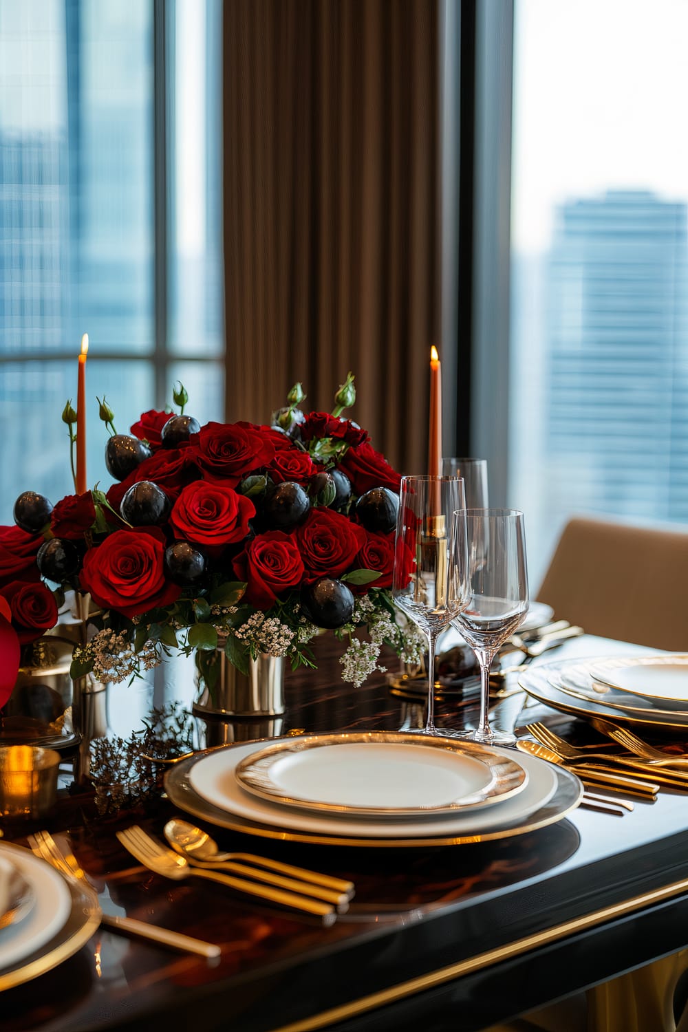 An elegant table setting with luxurious red roses, dark fruits, white flowers, and golden details, featuring fine white dinnerware, tall candles, and a cityscape view in the background.