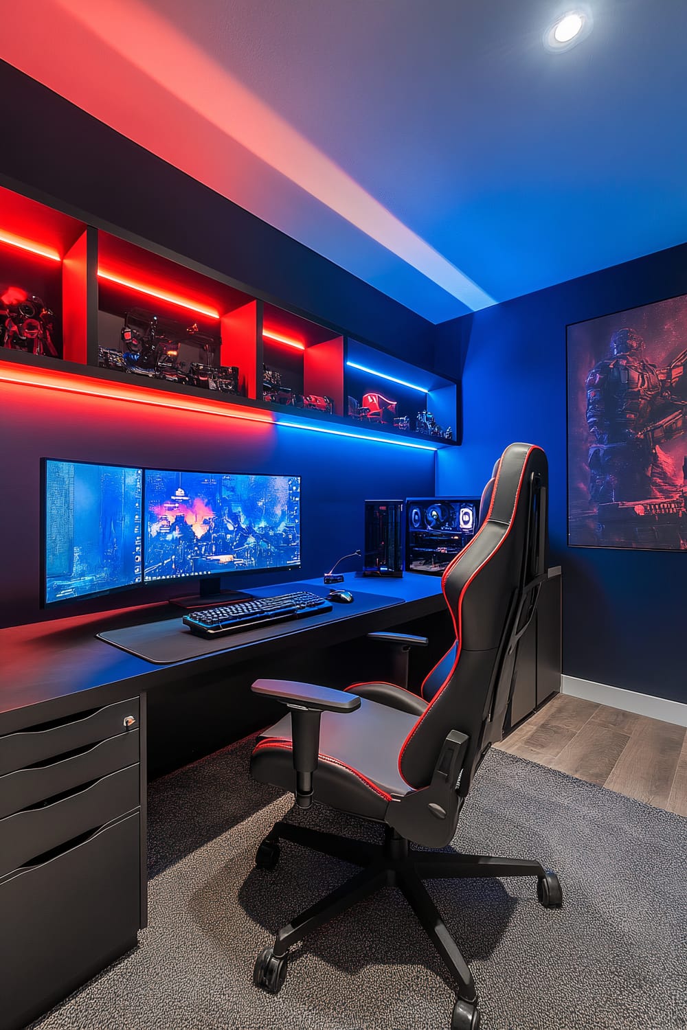 A gaming room with dark navy walls and colorful red and blue LED strip lights. In the center, there is a sleek black desk with a high-end gaming monitor displaying a vibrant scene. Beneath the monitor is a keyboard and mouse on a black desk mat. A comfortable ergonomic black gaming chair with red accents is positioned at the desk. Open shelving above the desk holds various gaming figurines and models illuminated by the LED lights. On the right side, the wall features a large poster of a futuristic soldier. The room is neatly organized and designed for an immersive gaming experience.