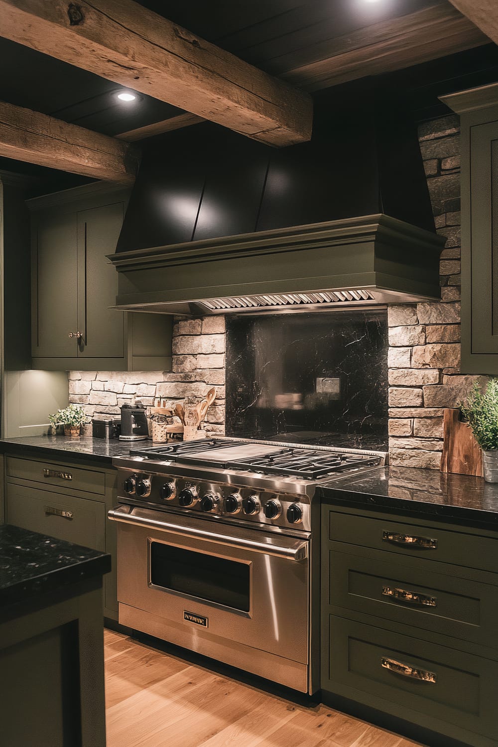 A serene moody farmhouse kitchen with dark olive cabinets and deep black granite countertops. The stainless steel range stands out against the dark backdrop, with a textured stone backsplash and exposed brick walls adding depth. Recessed ceiling fixtures provide ambient lighting, while under-cabinet LEDs emit a soft glow. Wooden beams on the ceiling enhance the rustic charm.