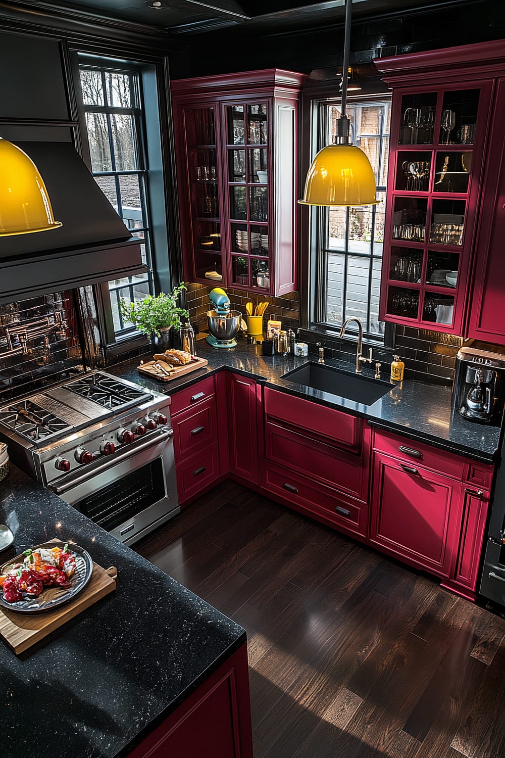 A top-down view of a modern farmhouse kitchen with burgundy cabinets, black granite countertops, bright yellow pendant lights, and dark wood floors. The kitchen features a gas range with a unique hood, an espresso maker, and open shelving with a hidden dishwasher.